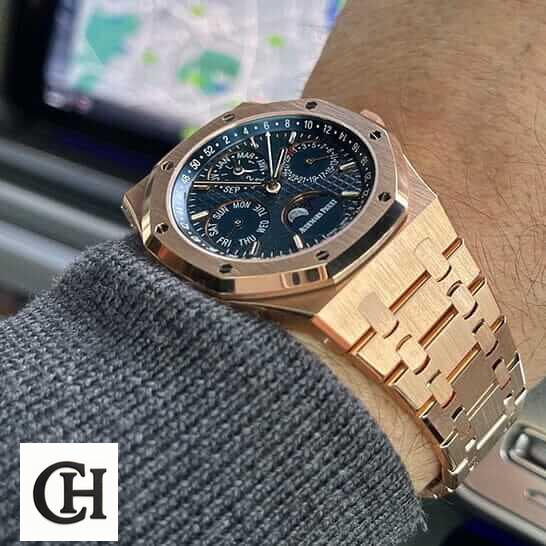 Audemars Piguet Royal Oak Chronograph 26240OR.OO.1320OR.01 Audemars Piguet Royal Oak Gold Blue Dial on the man wrist