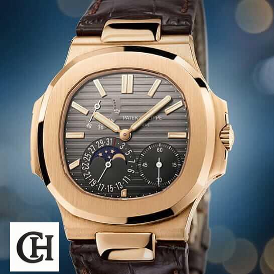 Patek Philippe Nautilus 5712R-001 Patek Philippe Nautilus Black Dial Leather Bracelet blue background