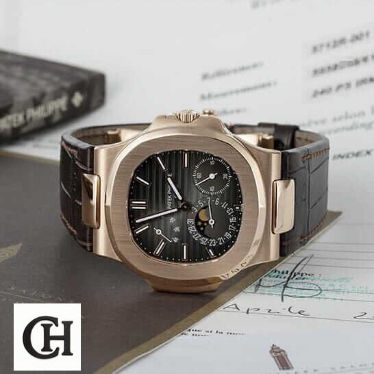 Patek Philippe Nautilus 5712R-001 Patek Philippe 5712R Rose Gold Bezel Black Dial side view