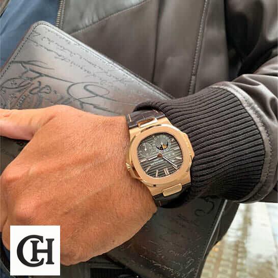 Patek Philippe Nautilus 5712R-001 Patek Philippe Nautilus Gold Case Leather Bracelet on the man wrist