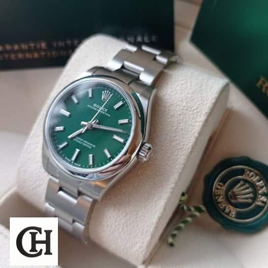 Rolex Perpetual 31 277200 Stainless Steel Case & clock cushion