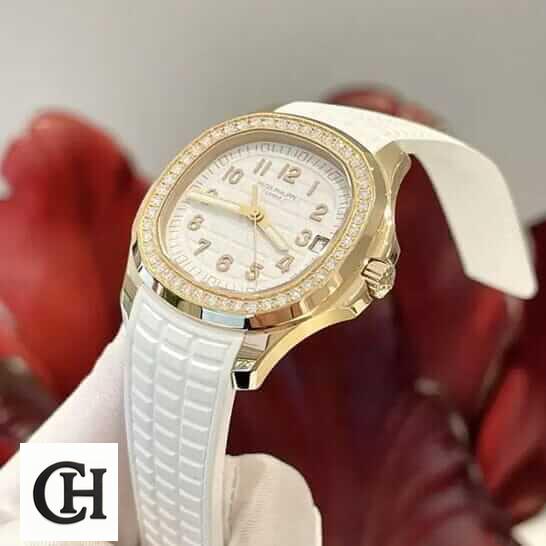 Patek Philippe Aquanaut Luce 5268/200R-012 "Diamond Bezel" First-Class patek philippe aquanaut luce 5 Patek Philippe Aquanaut Luce Diamond Bezel Gold Case red background