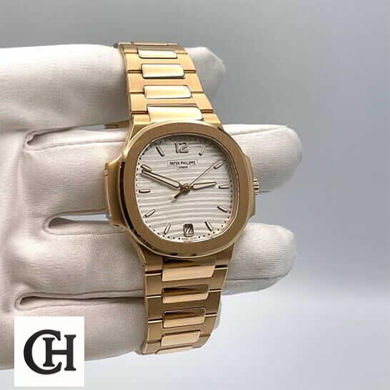 Patek Philippe Annual Calendar Moonphase 5396R-011 Patek Philippe Rose Gold White Dial on the white glove hand white background