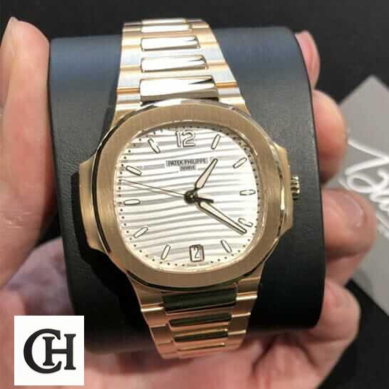 Patek Philippe Annual Calendar Moonphase 5396R-011 Patek Philippe Rose Gold White Dial on the stand
