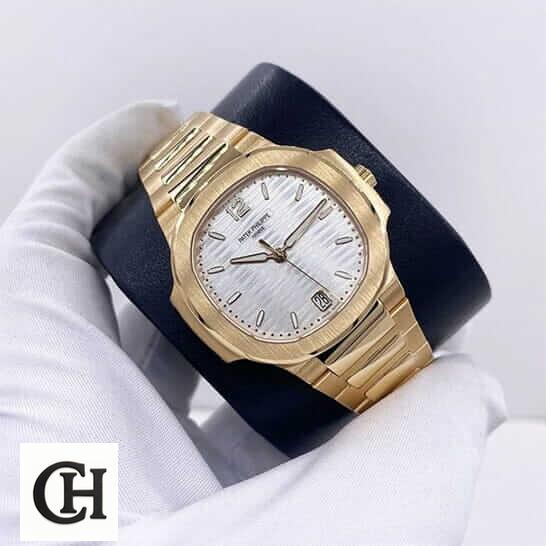 Patek Philippe Annual Calendar Moonphase 5396R-011 Patek Philippe White Dial Yellow Gold on the white glove hand